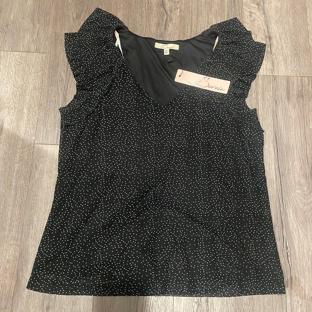 Beautiful black with with polka dot ruffled cap sleeve blouse